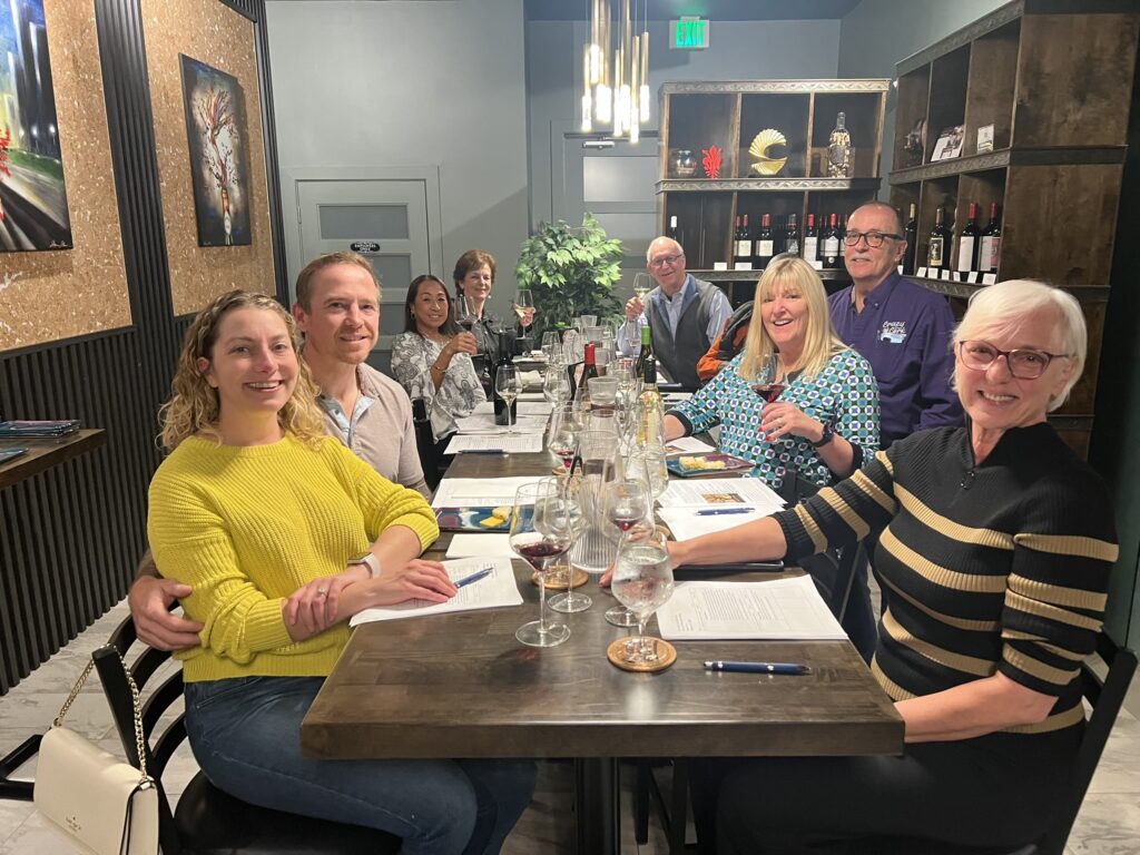 wine club, affordable, smiling people enjoying wine