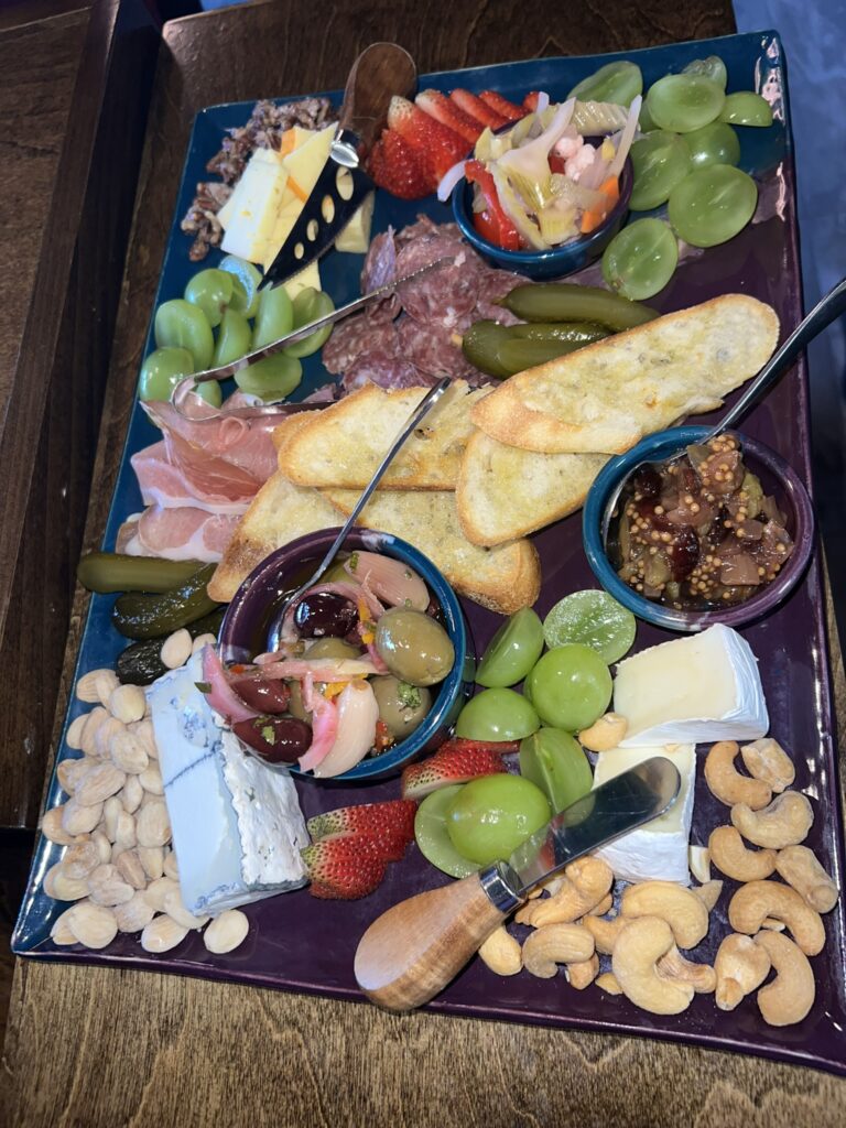 meats, cheeses, nuts, fruit, bread